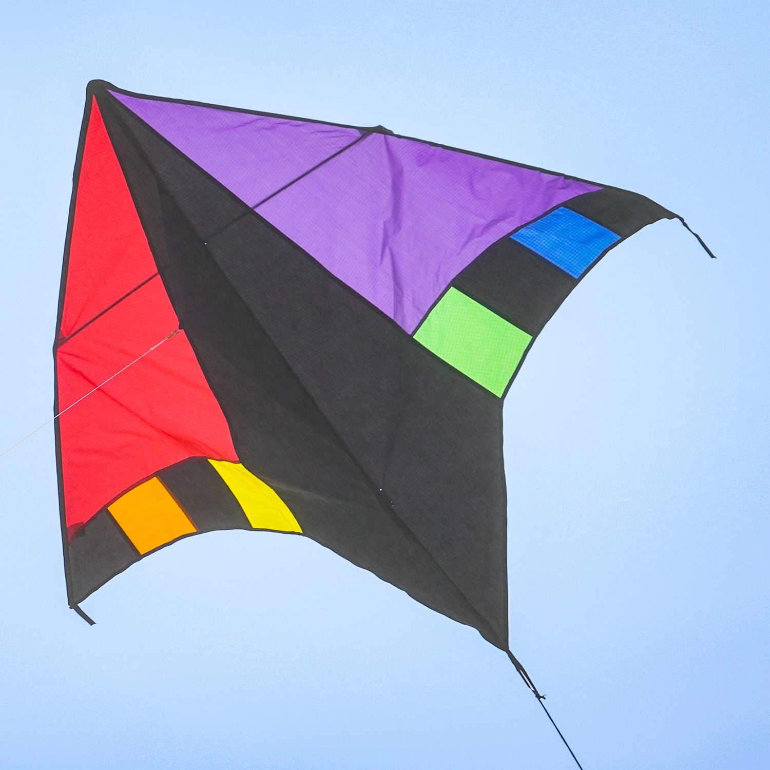 Rainbow Zephyr Delta Kite with a stunning 60-inch wingspan in bright rainbow colors, featuring a detachable twisting windsock for vibrant displays.