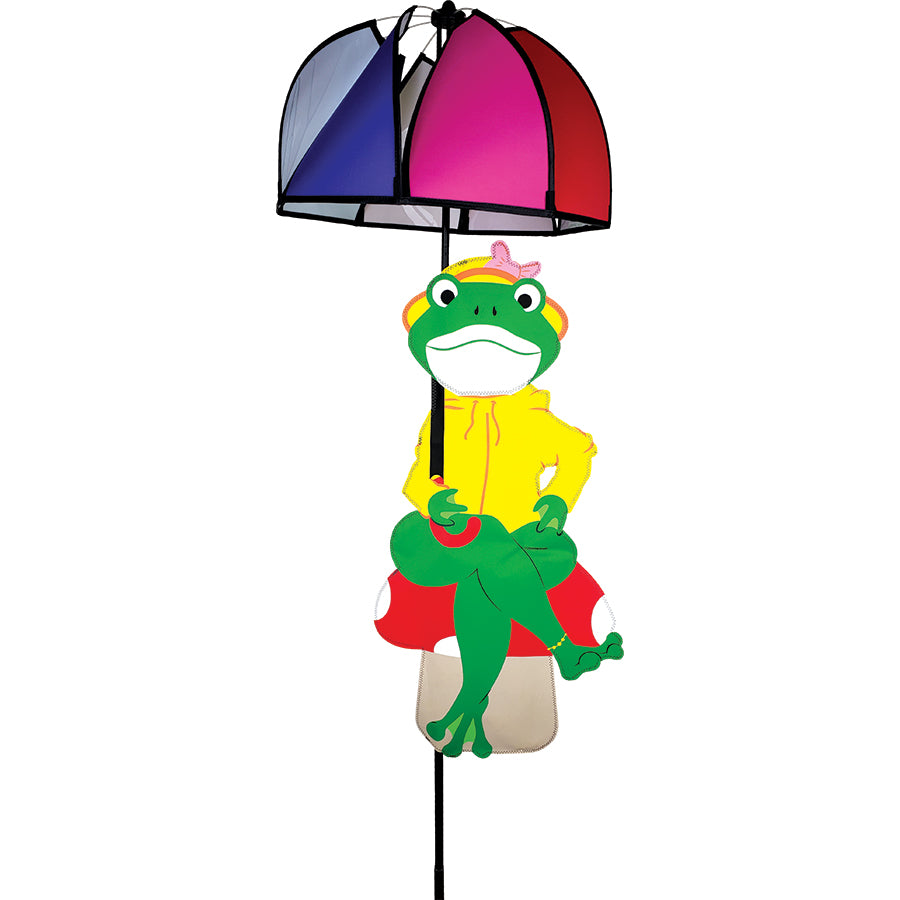The Raincoat Frog Umbrella Spinner features a cheerful frog in a raincoat on a sturdy fiberglass pole, spinning beautifully in a garden setting.
