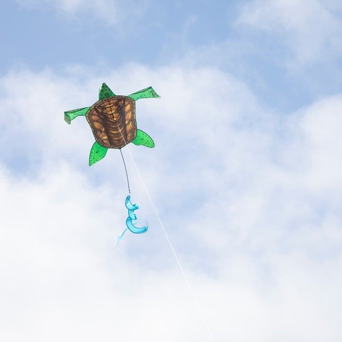Realistic Sea Turtle Kite soaring in the sky, featuring vivid detailed design, durable frame, and twister tail, captivating outdoor enthusiasts.