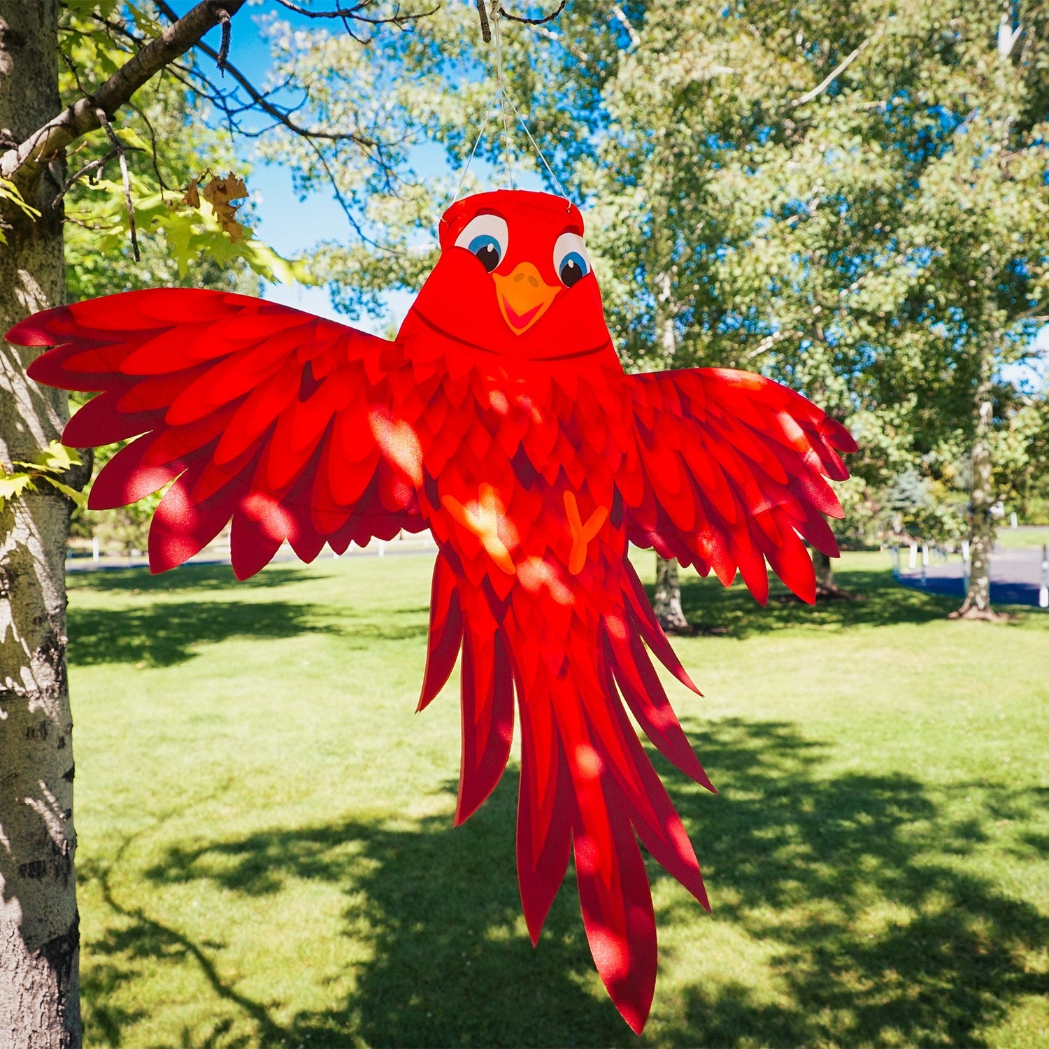 Red Bird Windsock in vivid colors, featuring permanently spread wings and an easy hanging system, enhances outdoor spaces with charm and joy.