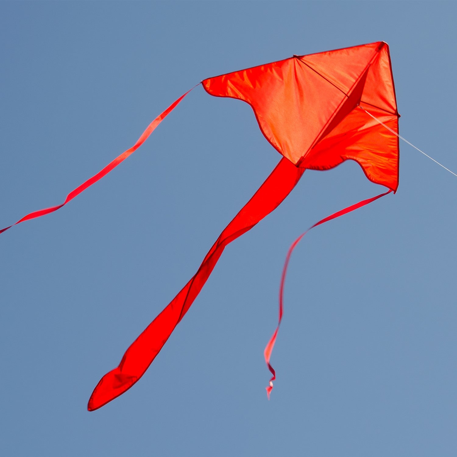 The Red Colorfly 43" Fly-Hi Kite is a vibrant red kite made for effortless flying in a variety of wind conditions, ideal for beginners and families.