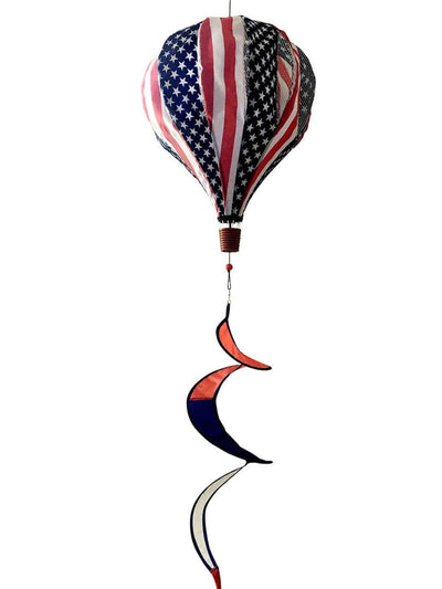 USA-themed hot air balloon spinner with stars and stripes, durable polyester design, and breezy motion for festive patriotic outdoor garden décor.
