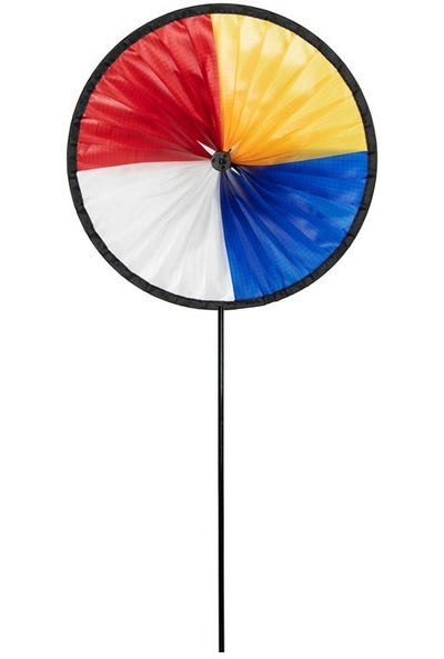 Red, White, Blue and Yellow Spinning Runner displayed in a garden, showcasing vibrant colors and dynamic spinning action.
