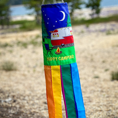 Retro Trailer 40" Windsock with colorful design and fluttering tails, hanging outdoors in a breezy setting, perfect for camping decor.