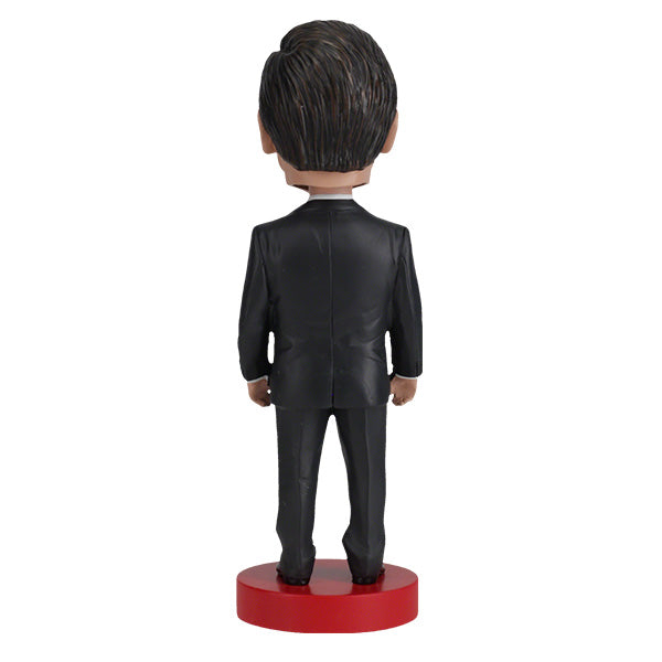 Ron DeSantis Bobblehead standing 7 inches tall, showcasing detailed features and vibrant colors, perfect for political display.
