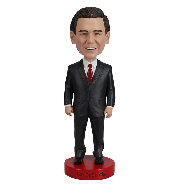 Ron DeSantis Bobblehead standing 7 inches tall, showcasing detailed features and vibrant colors, perfect for political display.