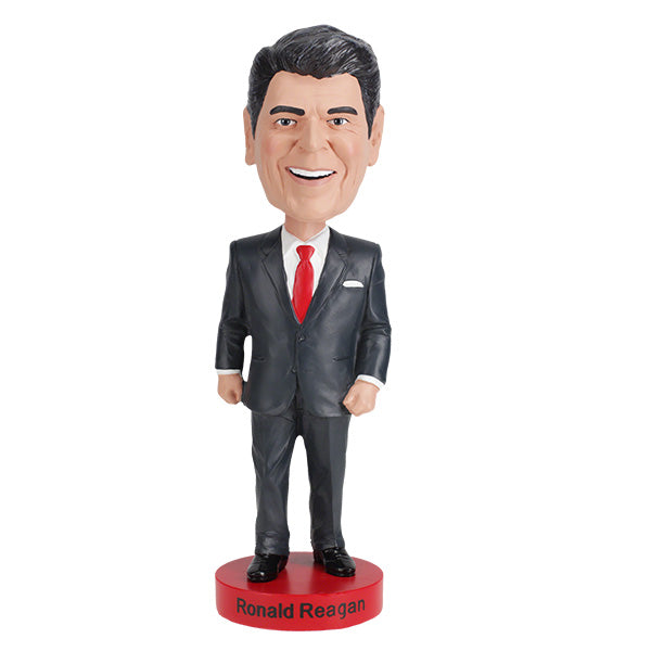 Ronald Reagan Bobblehead, a handcrafted 7-inch figure depicting the 40th President with a smiling expression, detailed suit, and in a collector's box.