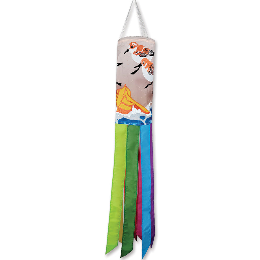 Vibrant 40-inch Sand Piper Birds windsock displayed outdoors, featuring whimsical bird designs fluttering in the breeze against a clear sky.