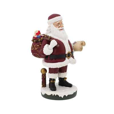 Santa Claus Bobblehips holiday bobblehead standing on a shelf, showcasing vibrant colors and intricate details, perfect for festive decoration.