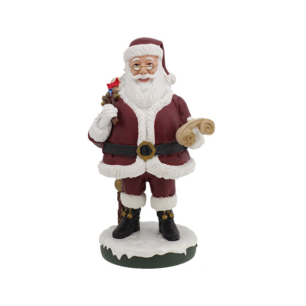 Santa Claus Bobblehips holiday bobblehead standing on a shelf, showcasing vibrant colors and intricate details, perfect for festive decoration.