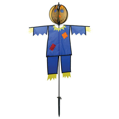 Colorful Scarecrow Ground Ball Spinner spinning in a garden setting, showcasing a friendly face with vibrant colors and durable design.