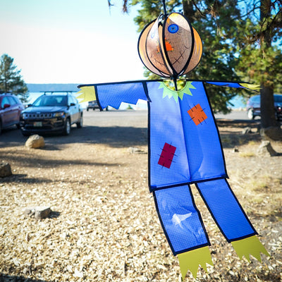 Scarecrow Hanging Ball Spinner made of weather-resistant materials, showcasing a friendly scarecrow head spinning in the wind to bring seasonal joy to your garden.
