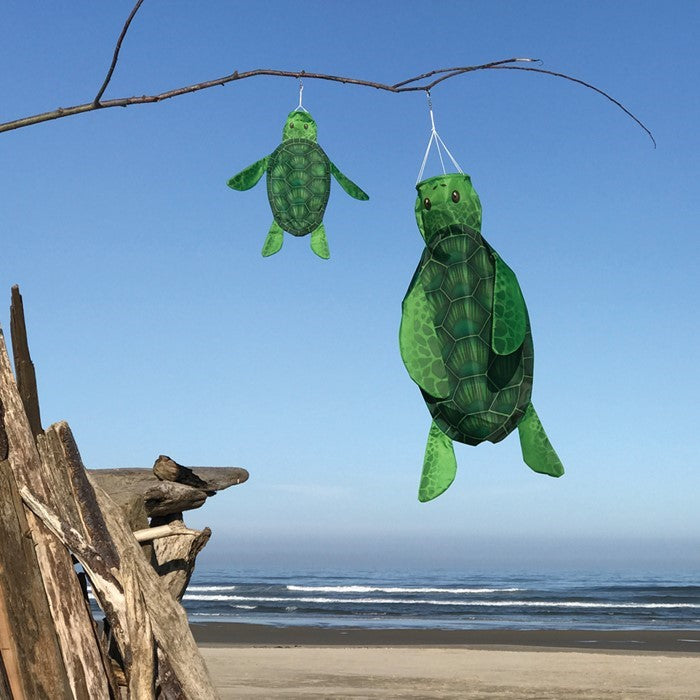 3D Sea Turtle Windsock flutters in the breeze with vibrant green colors, designed to mimic the appearance of a real turtle, perfect for outdoor decor.
