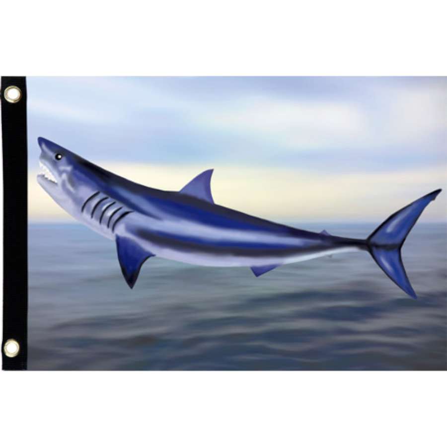 Seafarer Flag featuring an eye-catching Mako Shark design displayed on a flagpole against a backdrop of blue sky.