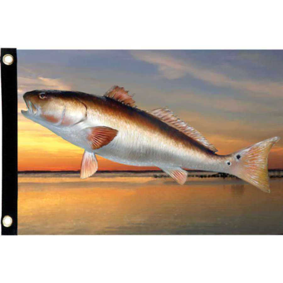 Seafarer Flag - Red Drum, a vibrant 3x5 flag featuring a nautical design displayed on a flagpole against a clear summer sky.
