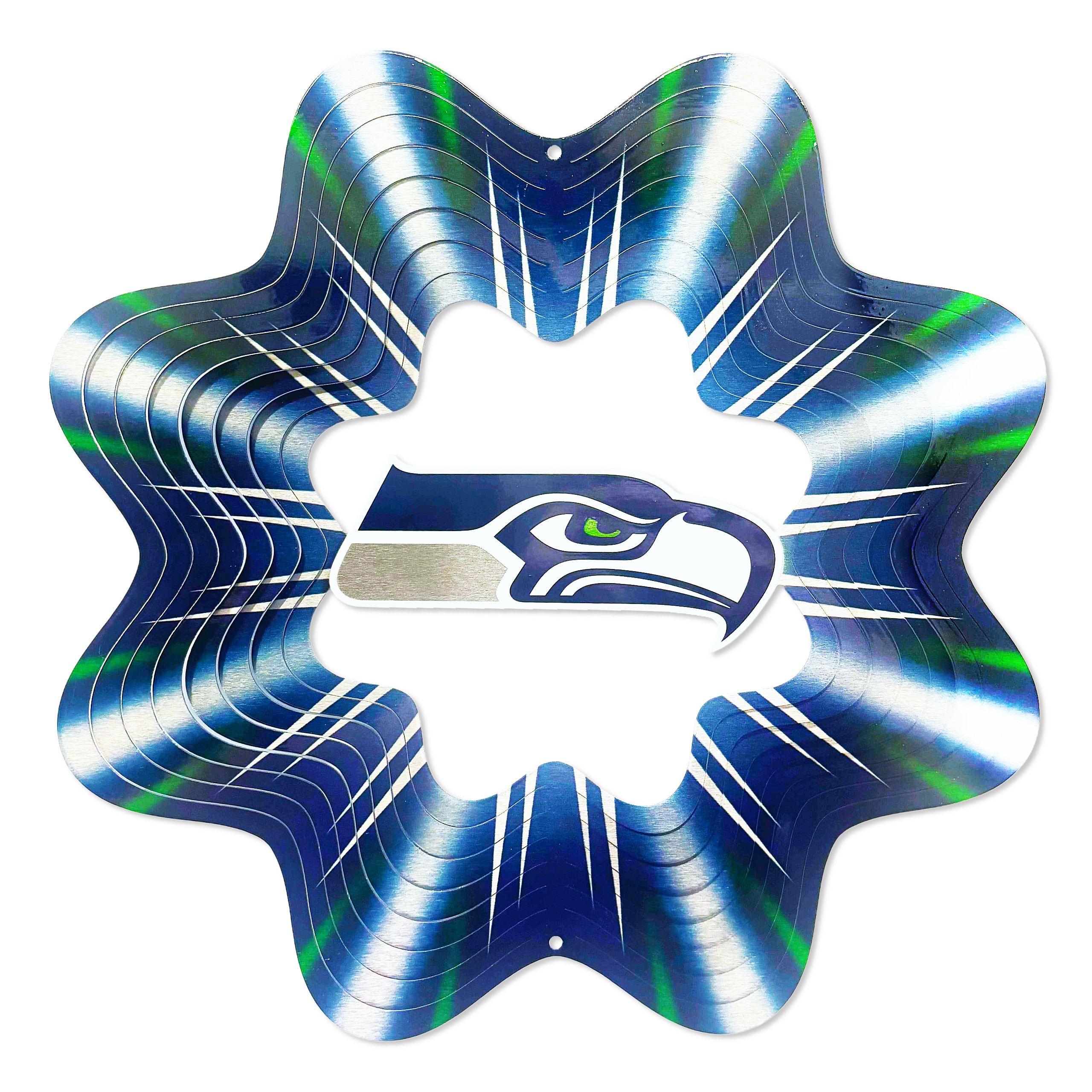 Vibrant Seattle Seahawks wind spinner featuring team-themed artwork displayed outdoors in a garden setting, spinning gracefully in the breeze.
