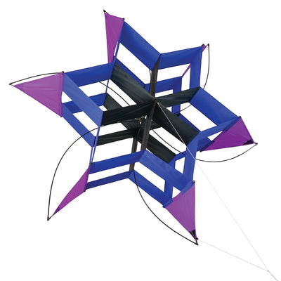 Shadow Cosmic Hex Kite soaring against a blue sky, showcasing its colorful design and cellular structure.