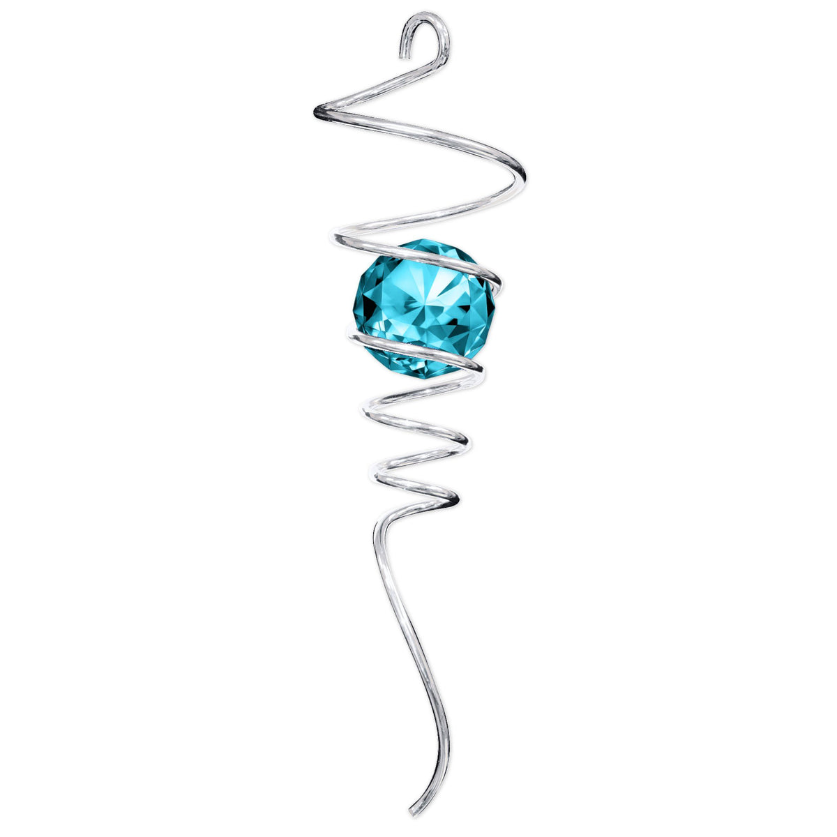 Silver Aqua Tail decorative spiral with a crystal accent, beautifully catching light against a backdrop of greenery in the outdoor setting.