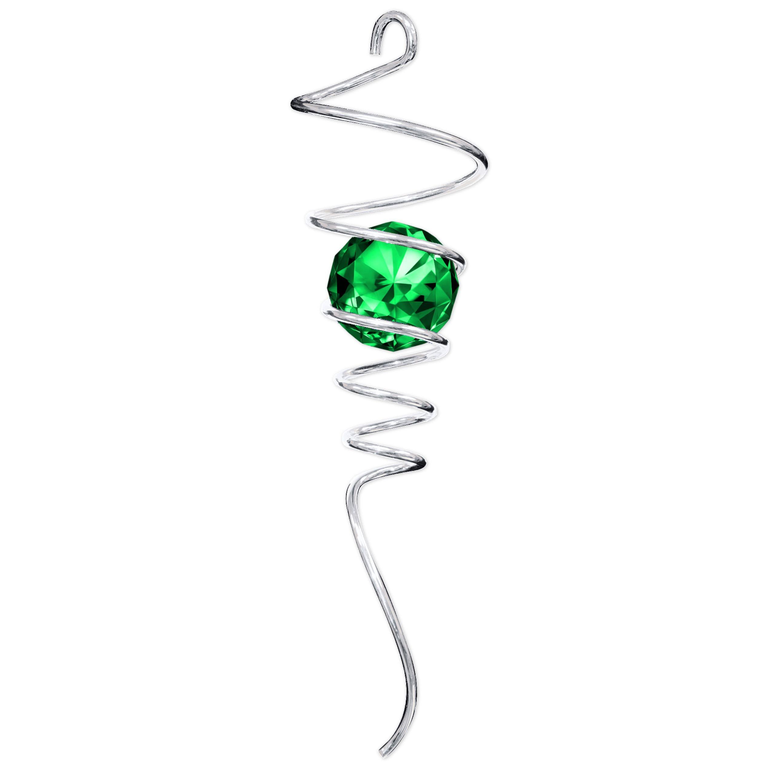 Elegant Silver Green Tail spiral design with crystal accents displayed outdoors, catching sunlight and enhancing the garden ambiance.