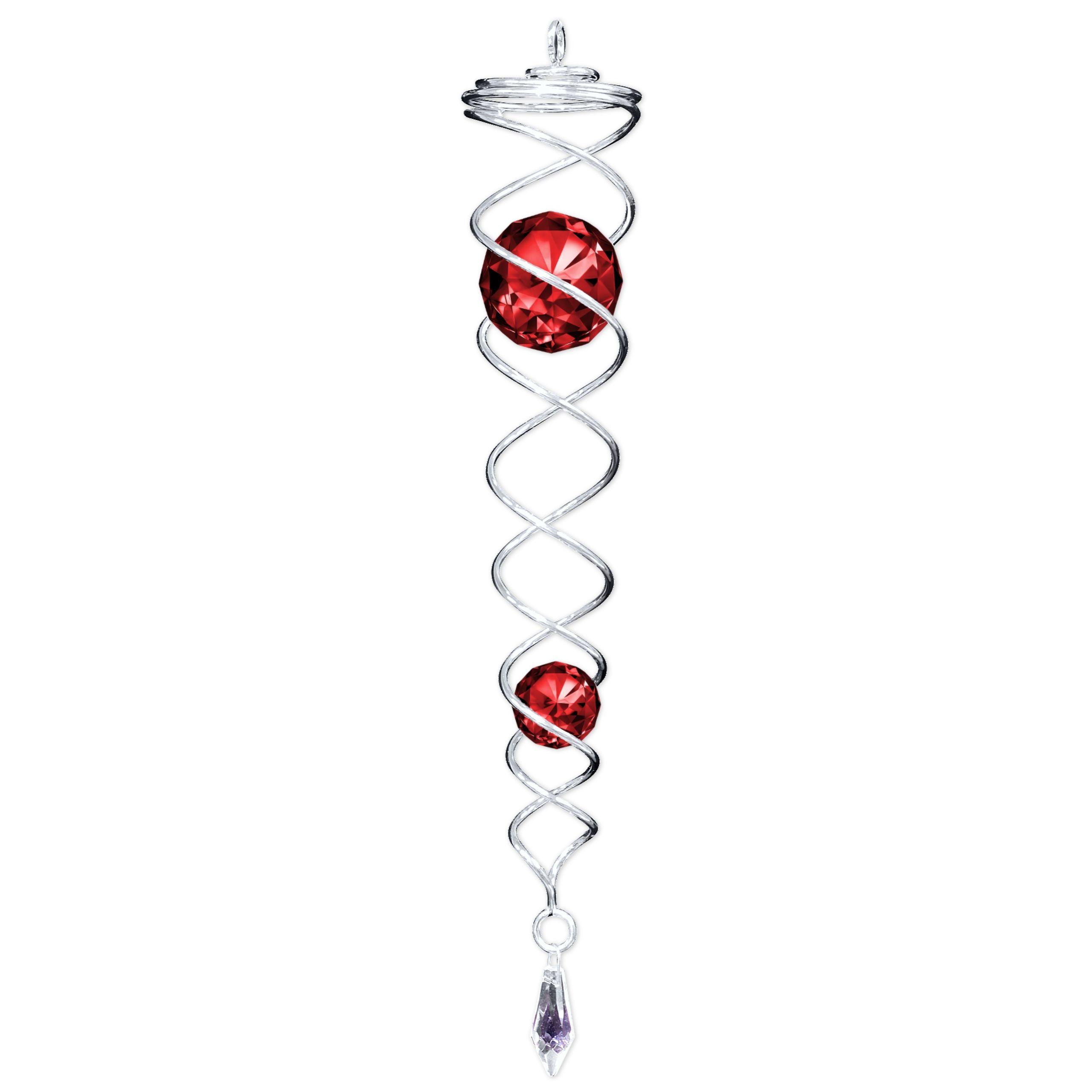 Silver Red Twister made from powder-coated stainless steel, featuring two sparkling red crystals that create captivating movement in an outdoor setting.