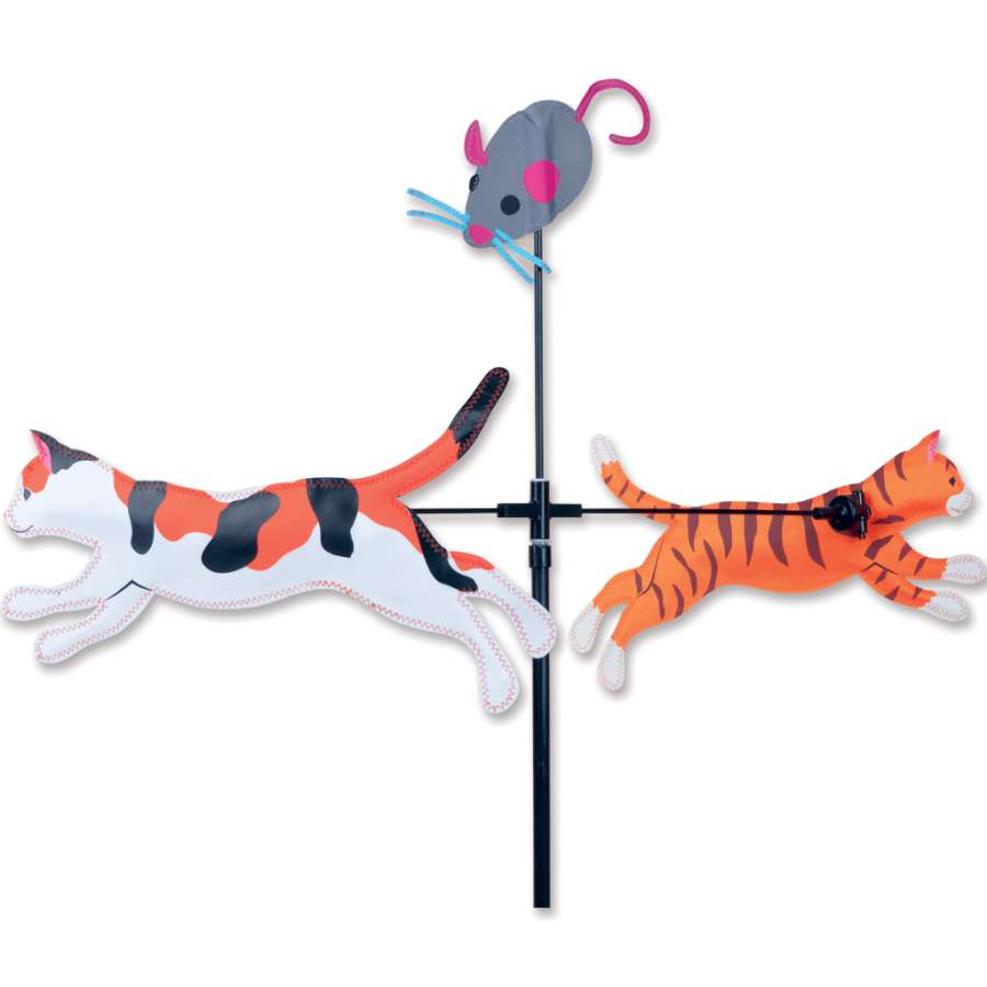 Single Carousel Spinner with playful cat motifs rotating gracefully in a lush garden setting, adding charm and whimsy to the outdoor decor.