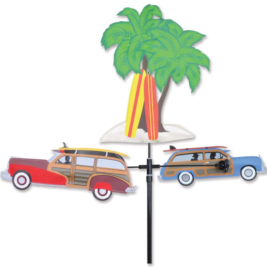 Single Carousel Spinner - Woodies displayed elegantly in a garden, showcasing intricate wooden shapes that spin in the wind under a sunny sky.