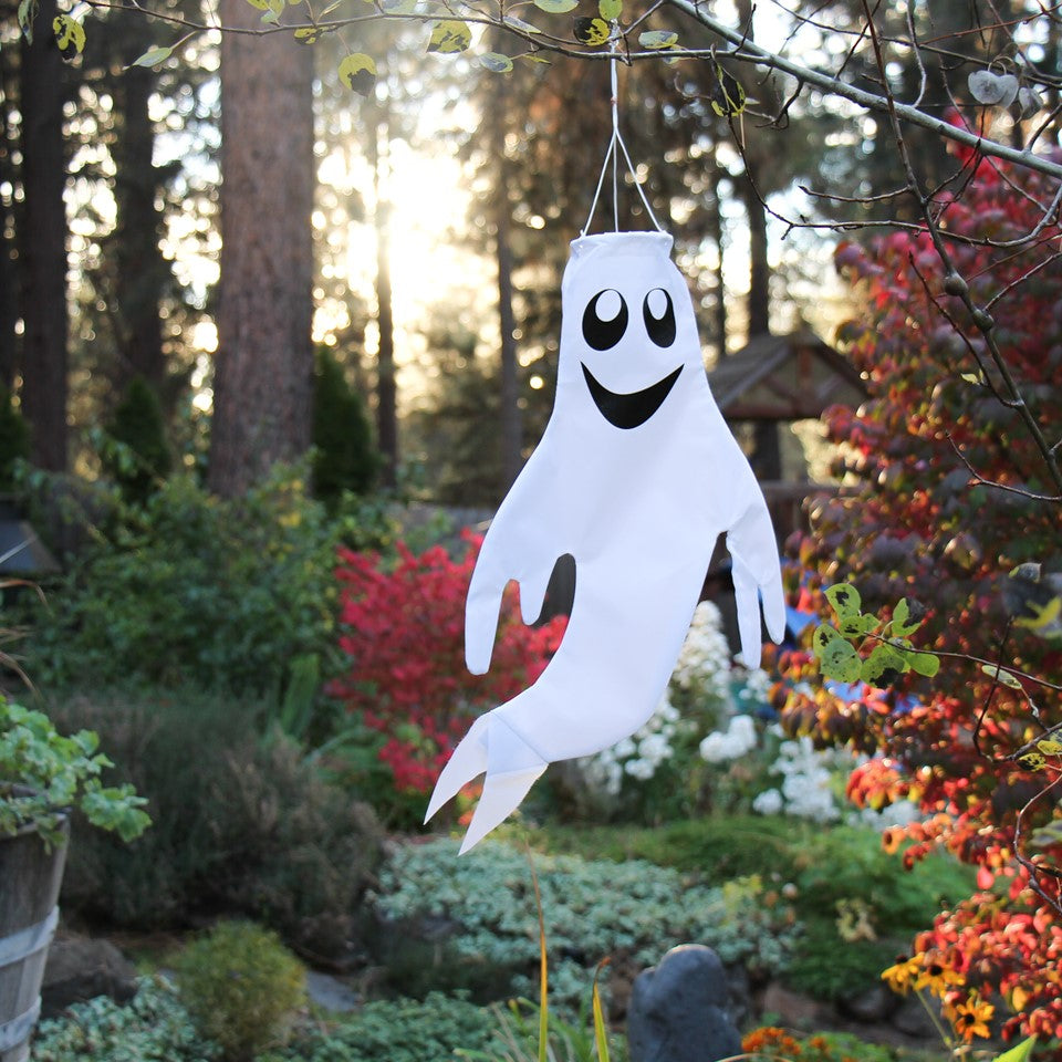 Small Ghost Windsock featuring a grinning ghost design swaying gently in the wind, perfect for autumn and Halloween decor.