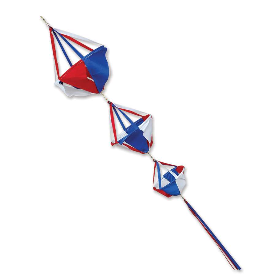 Small Spinnie Set - Patriot featuring colorful spinning decorations with 24-inch streamer tails displayed in a garden setting, showcasing patriotic spirit.