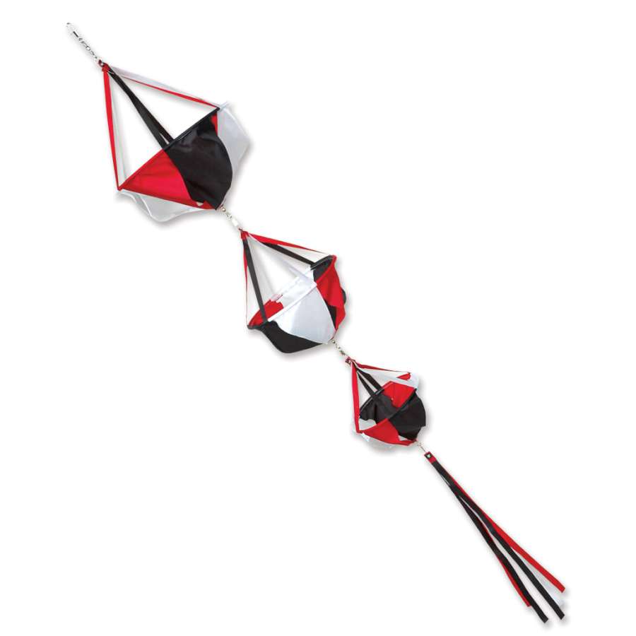Small Spinnie Set - Tecmo with colorful spinners and matching streamer tails, beautifully displayed outdoors in a garden setting.