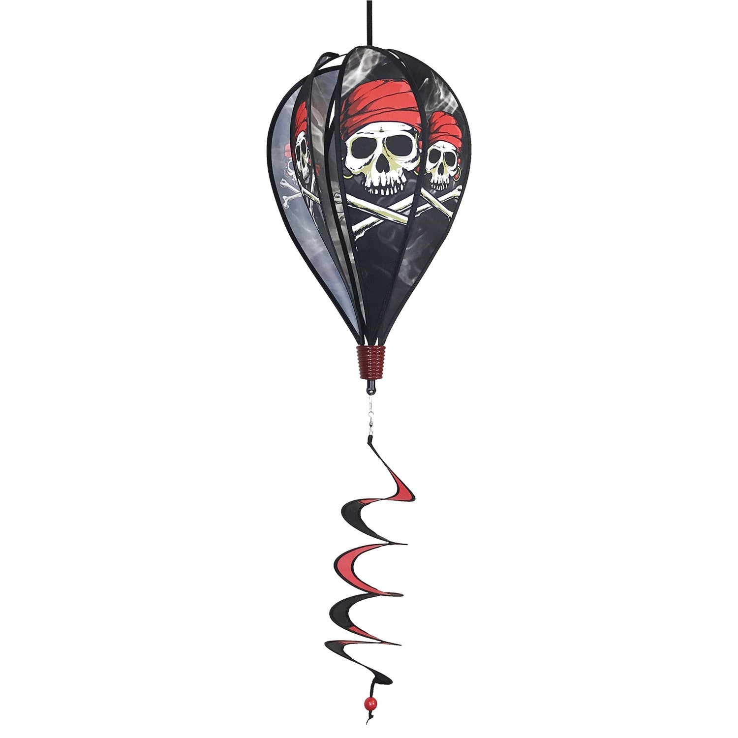 Smokin' Pirate Hot Air Balloon spinning in the breeze with a skull and crossbones design, adding vibrant decor to an outdoor garden setting.