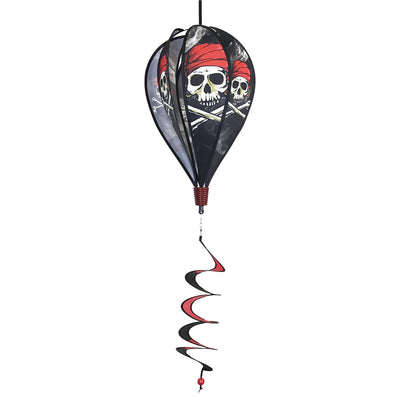 Smokin' Pirate Hot Air Balloon spinning in the breeze with a skull and crossbones design, adding vibrant decor to an outdoor garden setting.