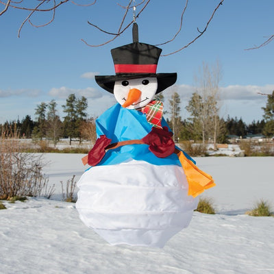Snowman Wind Friend fluttering in the breeze outdoors, adding a festive and snowy touch to your garden or porch for winter or holiday celebrations.