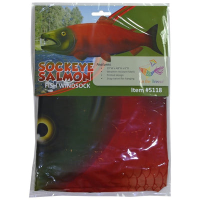 Sockeye Salmon 48-inch Fish Windsock featuring vibrant colors and detailed design, fluttering in the breeze at a marina.