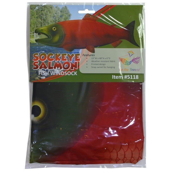 Sockeye Salmon 48-inch Fish Windsock featuring vibrant colors and detailed design, fluttering in the breeze at a marina.