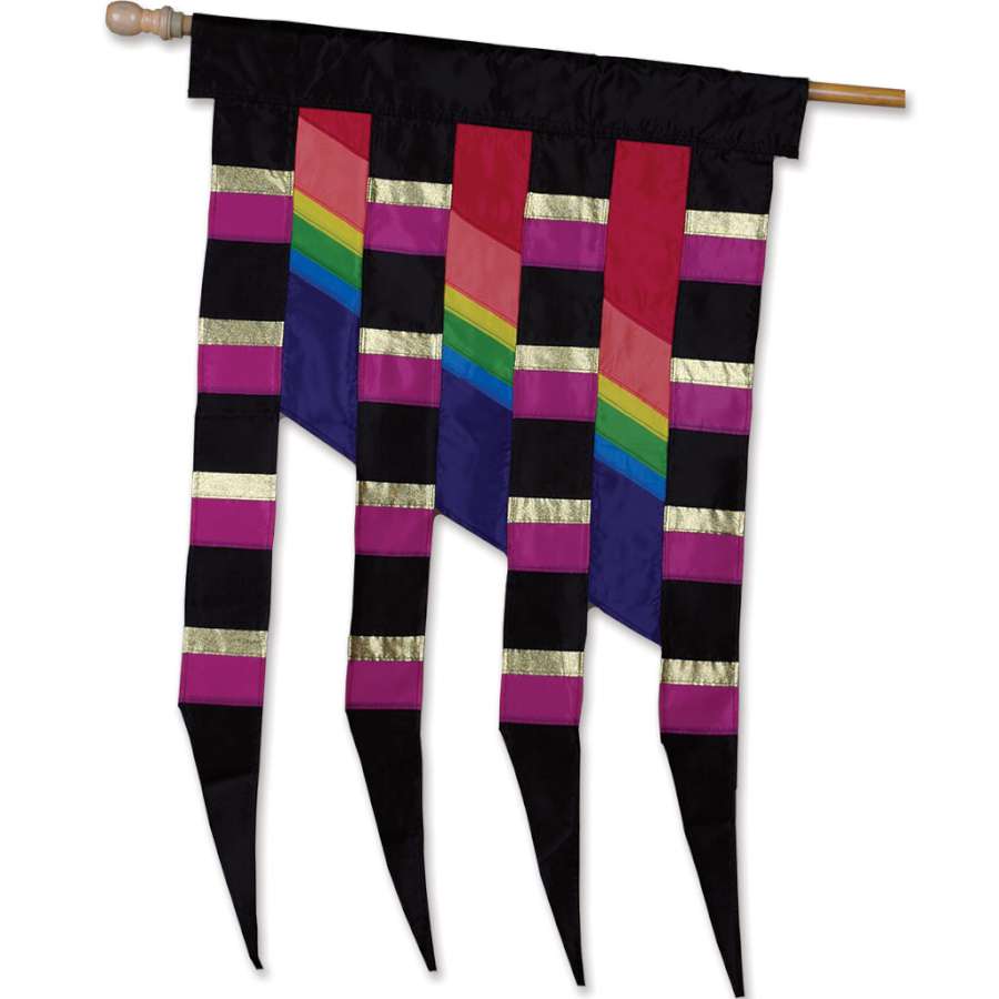 Vibrant SoundWinds 28 in. Progressive Banner - Astral displayed on a flag pole in a sunny outdoor garden setting, showcasing beautiful colors and patterns.