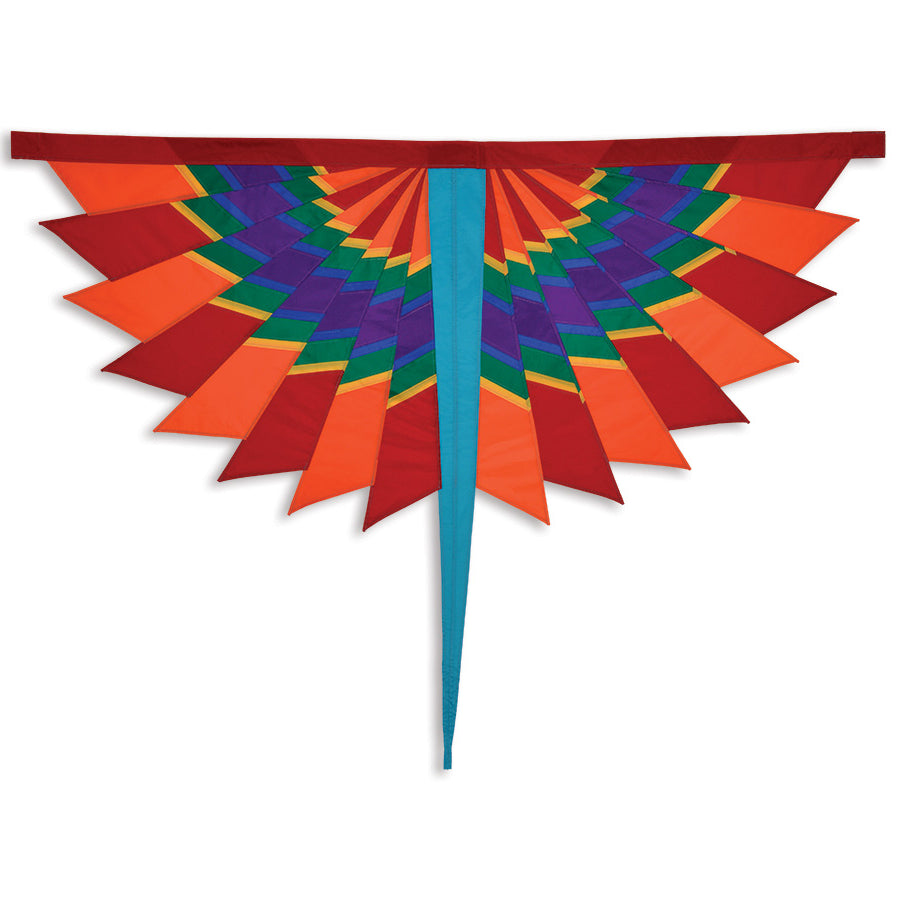 SoundWinds Fandance Banner in red and orange fluttering on a pole in a garden setting, showcasing its colorful design outdoors.
