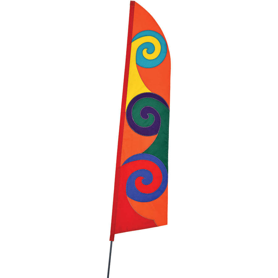 SoundWinds Pop Recumbent Bike Flag in vibrant orange, measuring 12 inches wide by 51 inches high, attached to a bike for better visibility on the road.