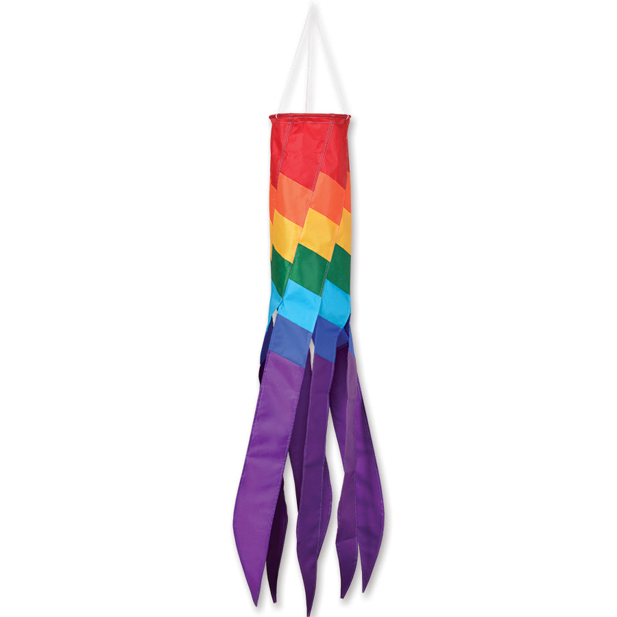 SoundWinds Rainbow Check Swirls Windsock, 39 inches with colorful swirls, hanging outdoors in a garden setting, dancing with the breeze.