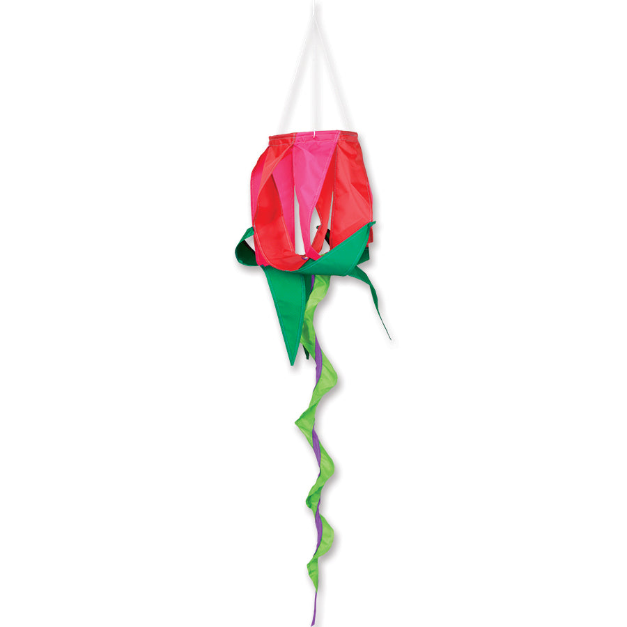 SoundWinds Red Rose Spinning Windsock measuring 29 inches with a vibrant red rose design swirling in the breeze, enhancing an outdoor garden setting.