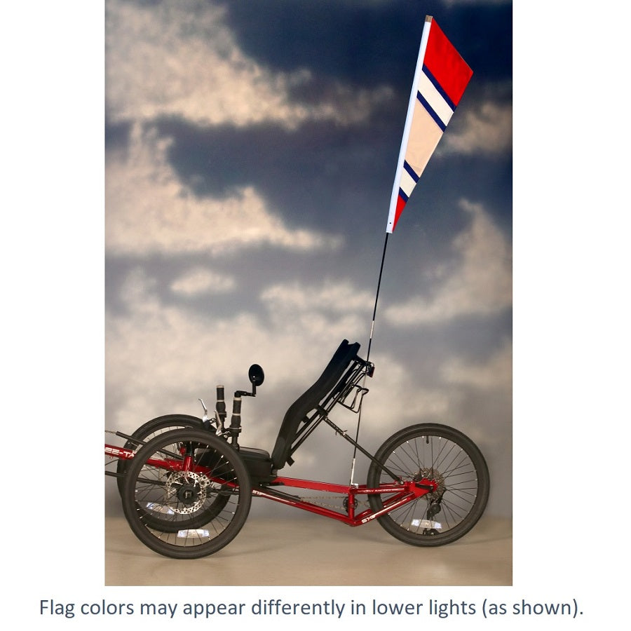 SoundWinds Reflective Fanion Recumbent Bike Flag in red, measuring 9x33.5 inches, displayed on a bike, enhancing visibility and safety on the road.