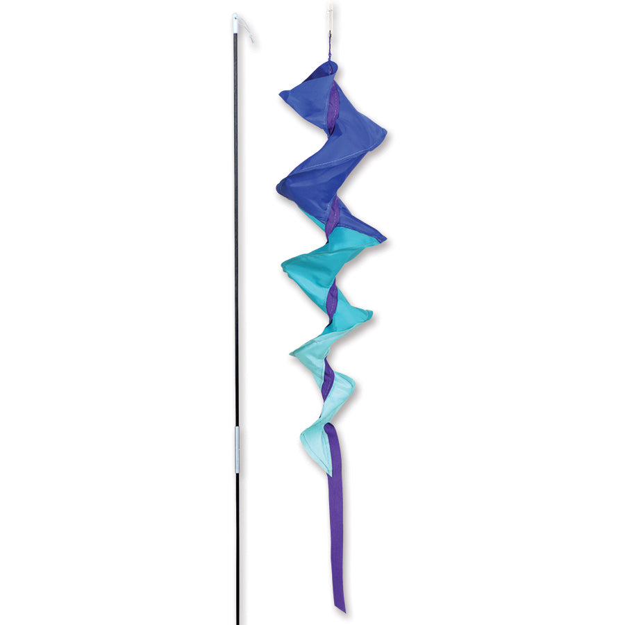SoundWinds Small Fusilli Spinning Recumbent Bike Windsock in blue displayed on a bike, spinning elegantly in the wind against an outdoor backdrop.