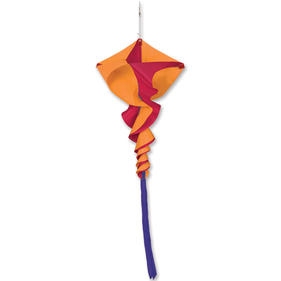 SoundWinds Small Rotini Spinning Windsock in orange gracefully swirling in the outdoor breeze, adding color and charm to a garden setting.