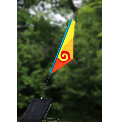 SoundWinds Spiral Recumbent Bike Flag displayed in a bright yellow color attached to a bicycle, featuring a durable pole designed for outdoor cycling.