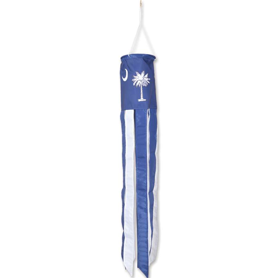 Vivid South Carolina windsock with palmetto tree and crescent moon design hanging from a pole, fluttering in the outdoor breeze.