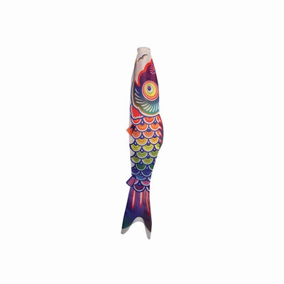 3' Spectrum Koi Fishsock in vibrant rainbow colors hanging gracefully in a garden setting, showcasing its whimsical design and lightweight construction.
