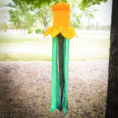 Spring Daffodil Floral Windtail featuring 3D daffodil blooms and colorful tails, elegantly displayed outdoors, gently swaying in the breeze.
