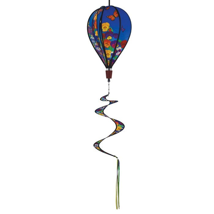 Colorful Spring Pansies 6-Panel Hot Air Balloon spinner in outdoor setting, showcasing bright floral patterns and spinning gracefully.