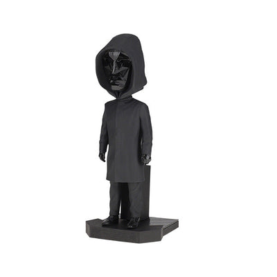 8-inch Squid Games Front Man Bobblehead featuring intricate details, black outfit, and mask, displayed prominently on a shelf.