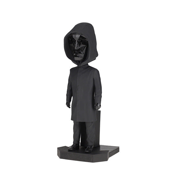8-inch Squid Games Front Man Bobblehead featuring intricate details, black outfit, and mask, displayed prominently on a shelf.