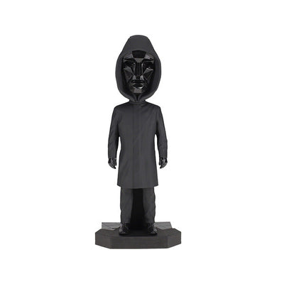 8-inch Squid Games Front Man Bobblehead featuring intricate details, black outfit, and mask, displayed prominently on a shelf.